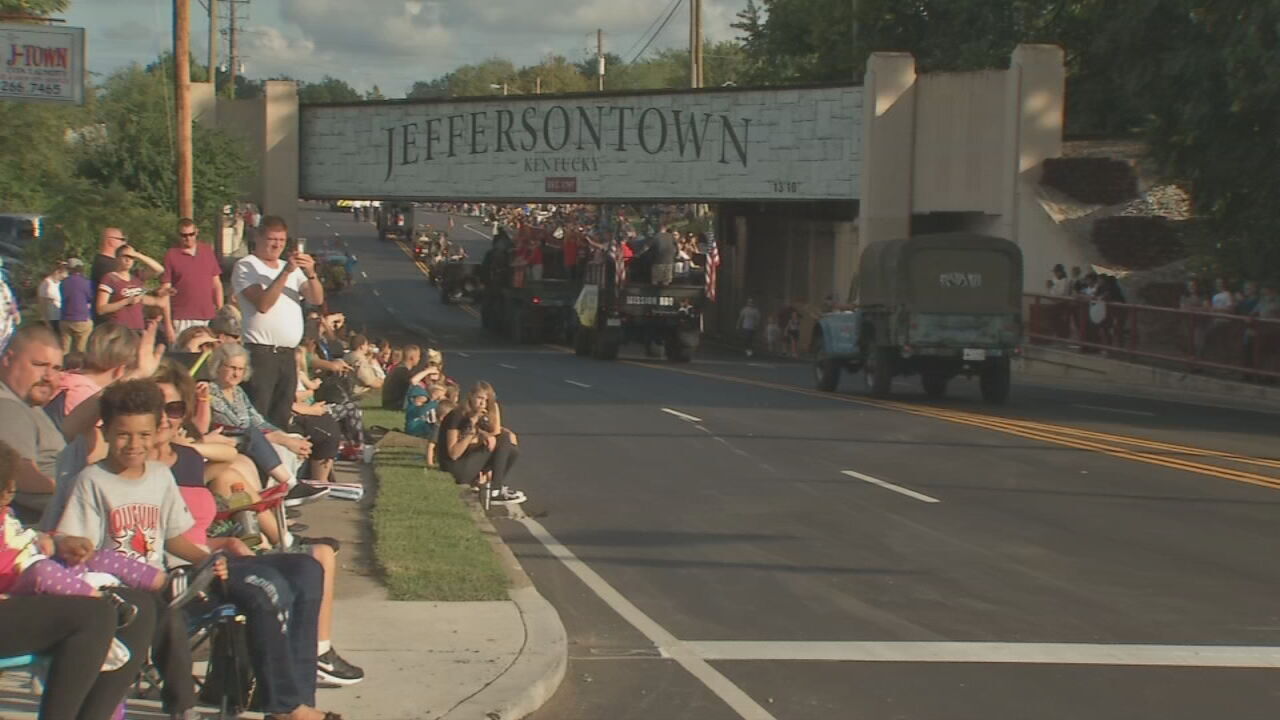People watch the Gaslight Festival parade in Jeffersontown, Ky.